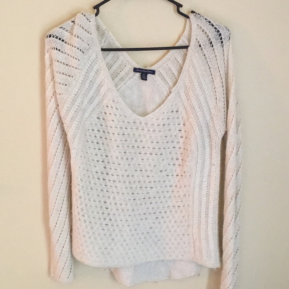 White sweater with faint sparkles